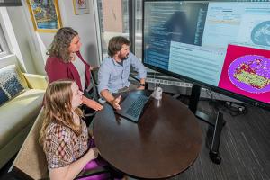 Photo of Jeanette Johnson, PhD, Elana Fertig, PhD, and Daniel Bergman, PhD
